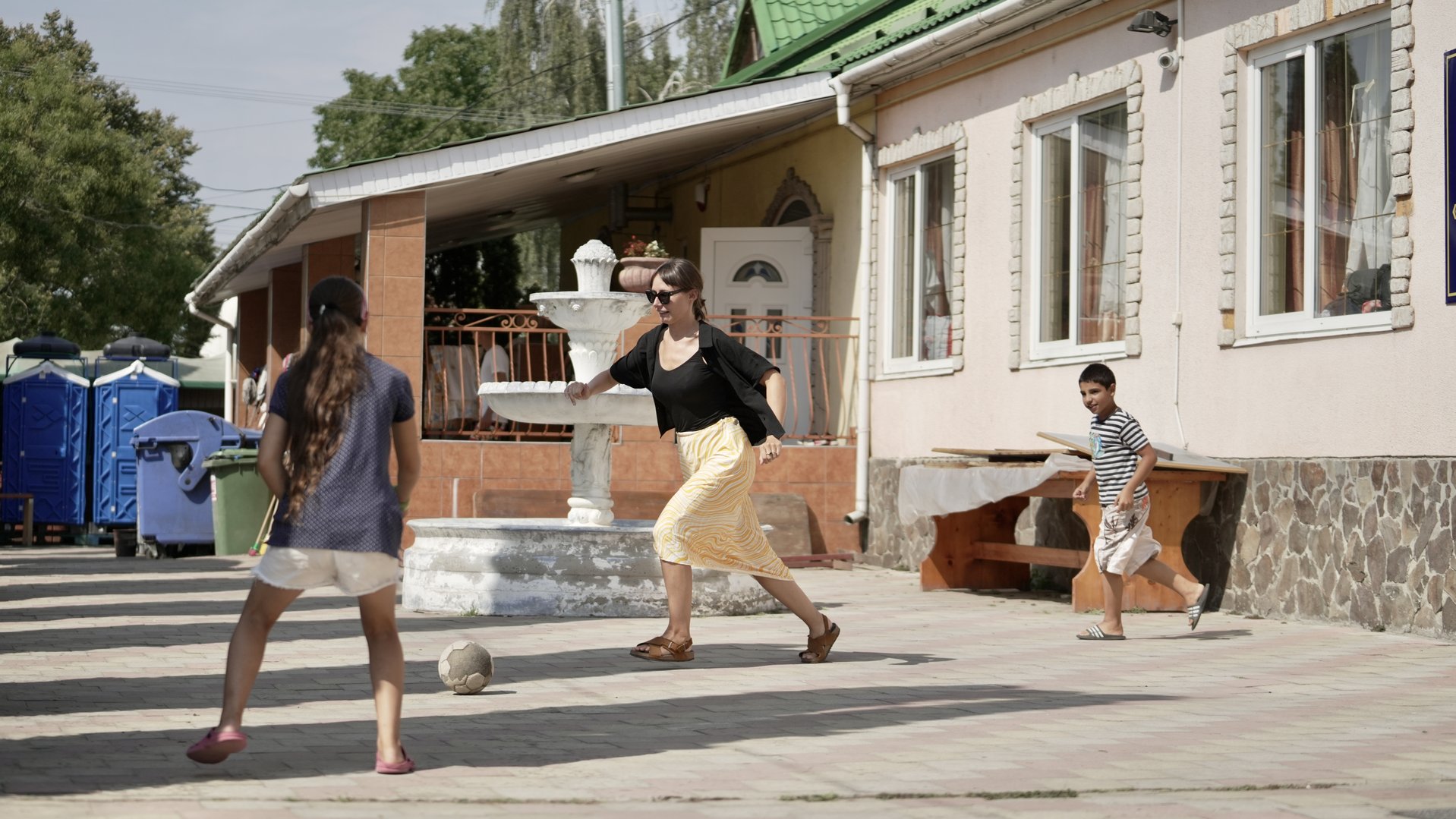 Children in a shelter in Ukraine playing football